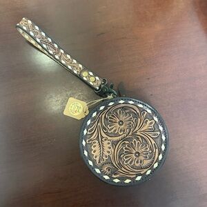 Floral Embossed Leather Wristlet